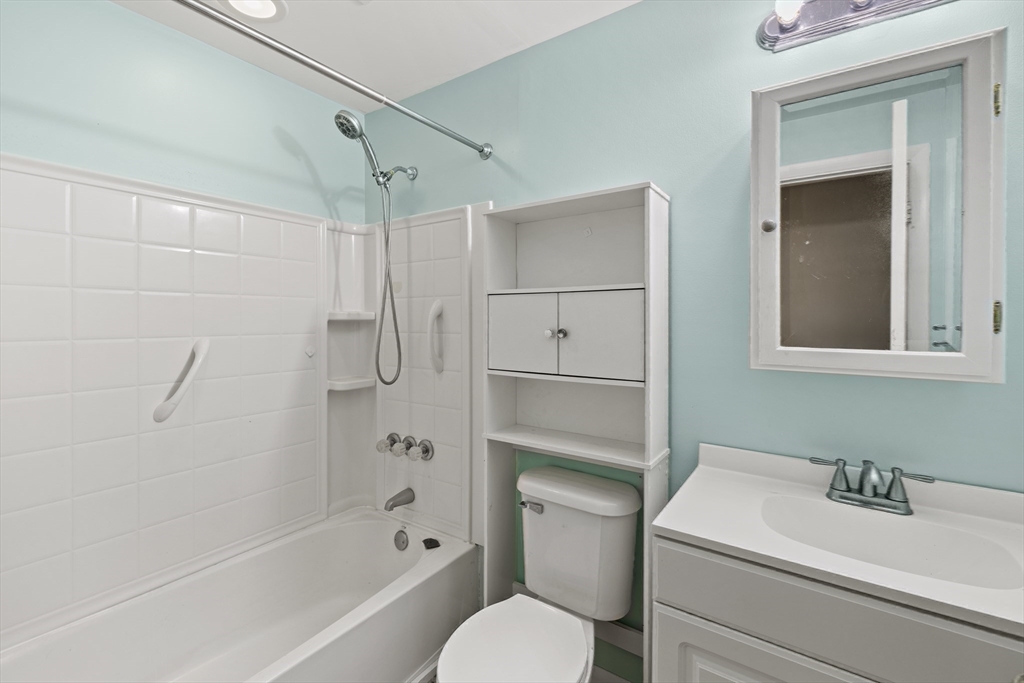 13 Naushon Road West Wareham, MA 02576 - Photo 23 of 29 a bathroom with a sink a toilet and shower