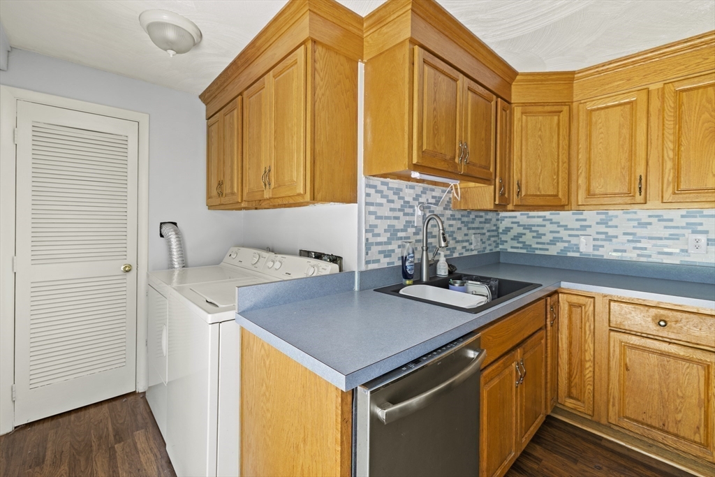13 Naushon Road West Wareham, MA 02576 - Photo 8 of 29 a kitchen that has a sink and a stove