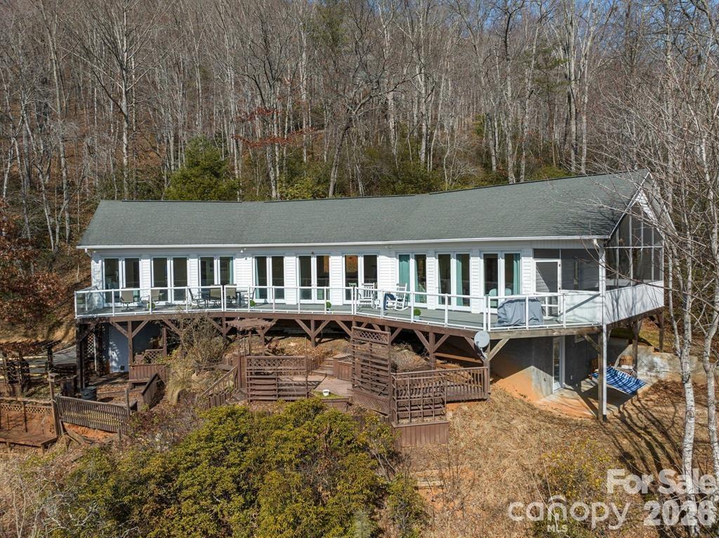 56 Great Horned Owl Road Candler, NC 28715 - Photo 3 of 32 a view of a house with pool and sitting area
