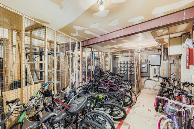 a living room with furniture and white walls