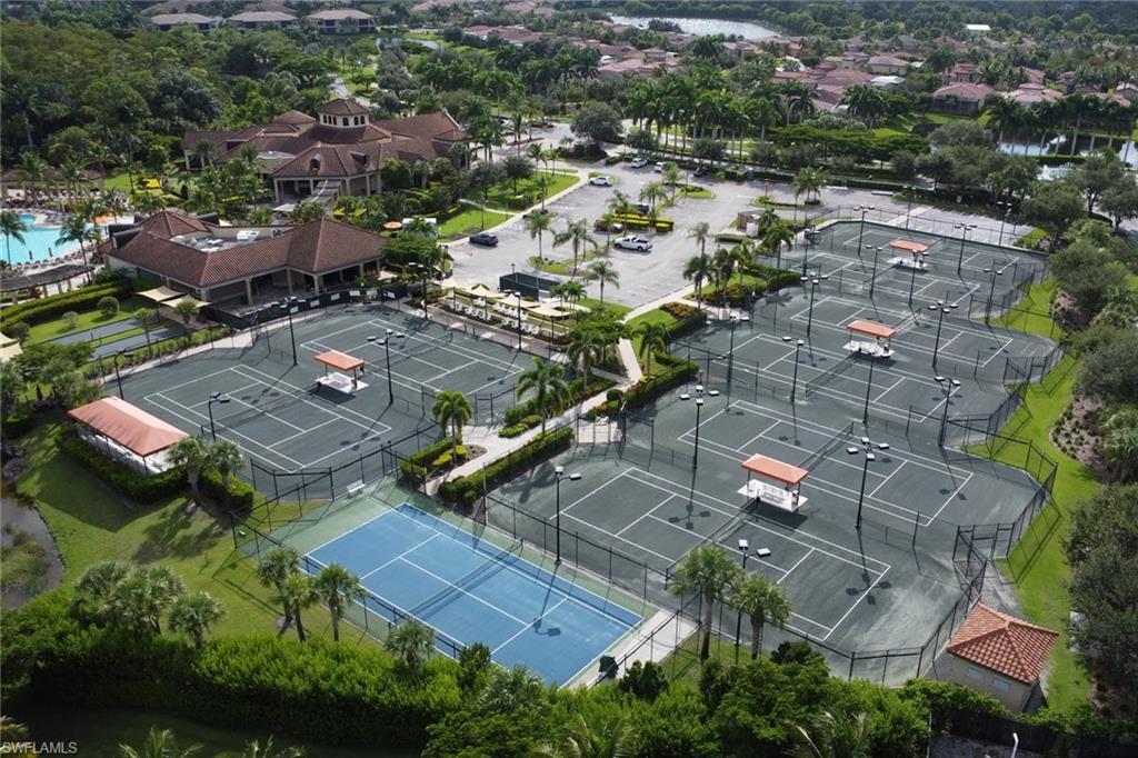 9560 Trevi Court, Unit 4814 Naples, FL 34113 - Photo 24 of 42 an aerial view of residential houses with outdoor space
