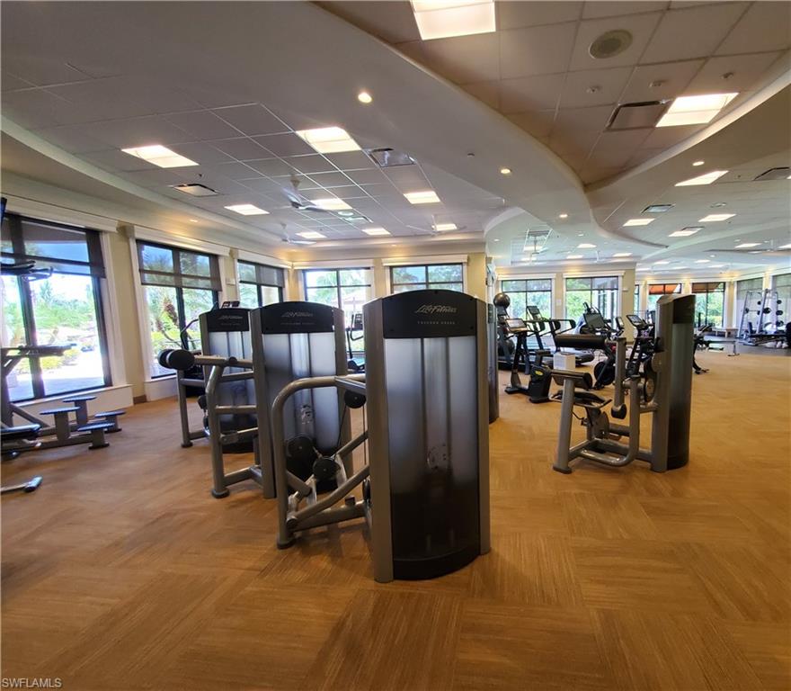 9560 Trevi Court, Unit 4814 Naples, FL 34113 - Photo 30 of 42 a view of a room with gym equipment