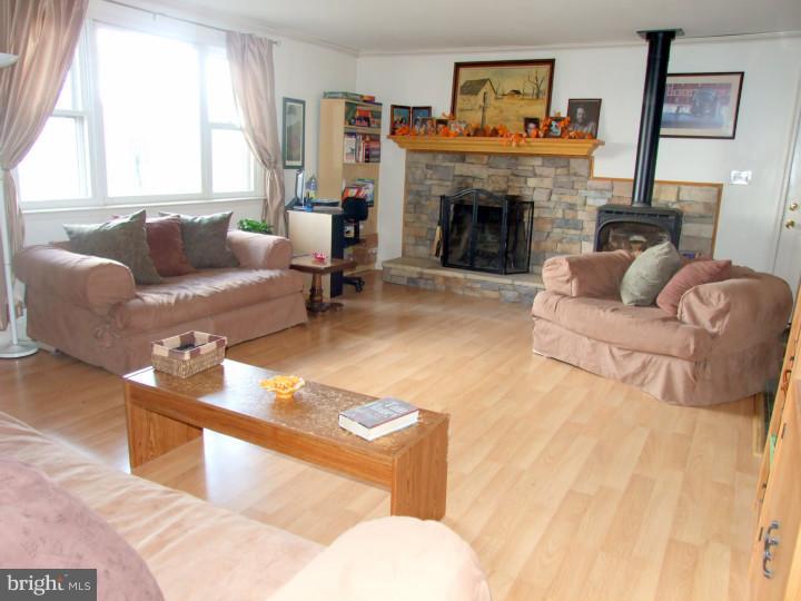 13 Witwer Road Christiana, PA 17509 - Photo 4 of 19 a living room with furniture and a fireplace