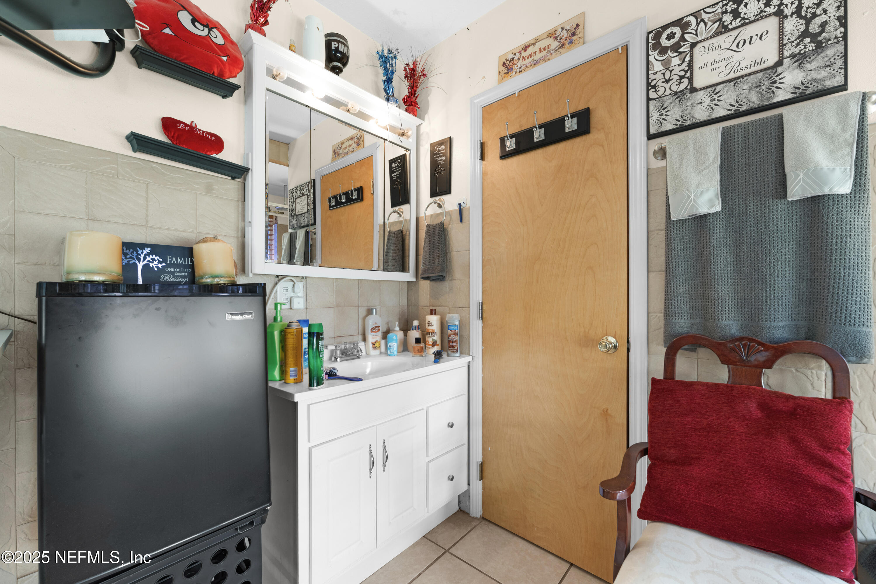 5845 Ransom Street Jacksonville, FL 32211 - Photo 16 of 23 a kitchen with stainless steel appliances a refrigerator and a stove