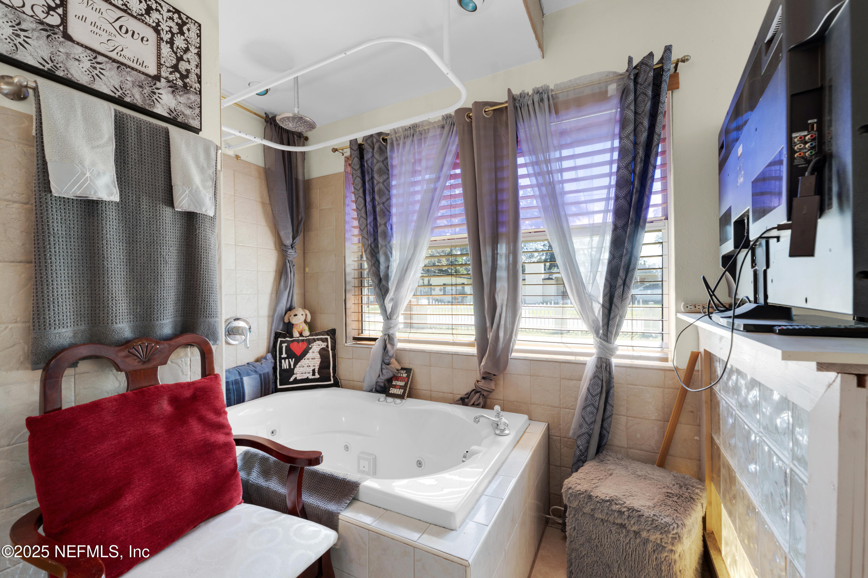 5845 Ransom Street Jacksonville, FL 32211 - Photo 17 of 23 a living room with furniture and a large window