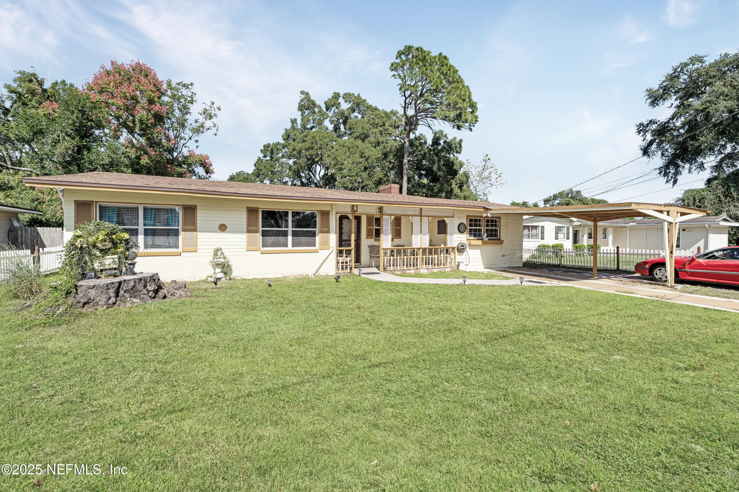 5845 Ransom Street Jacksonville, FL 32211 - Photo 2 of 23 a view of a house with a backyard