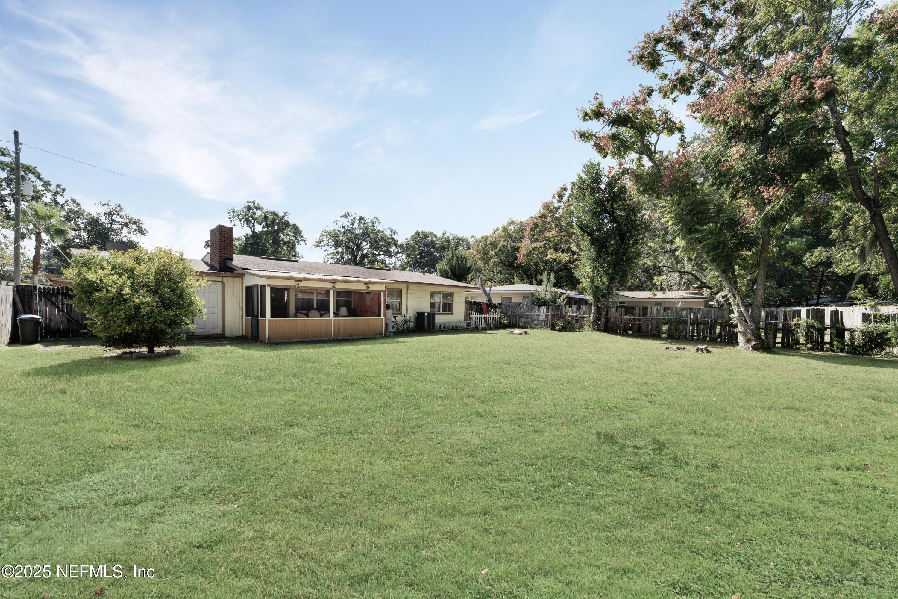5845 Ransom Street Jacksonville, FL 32211 - Photo 22 of 23 a front view of a house with a garden