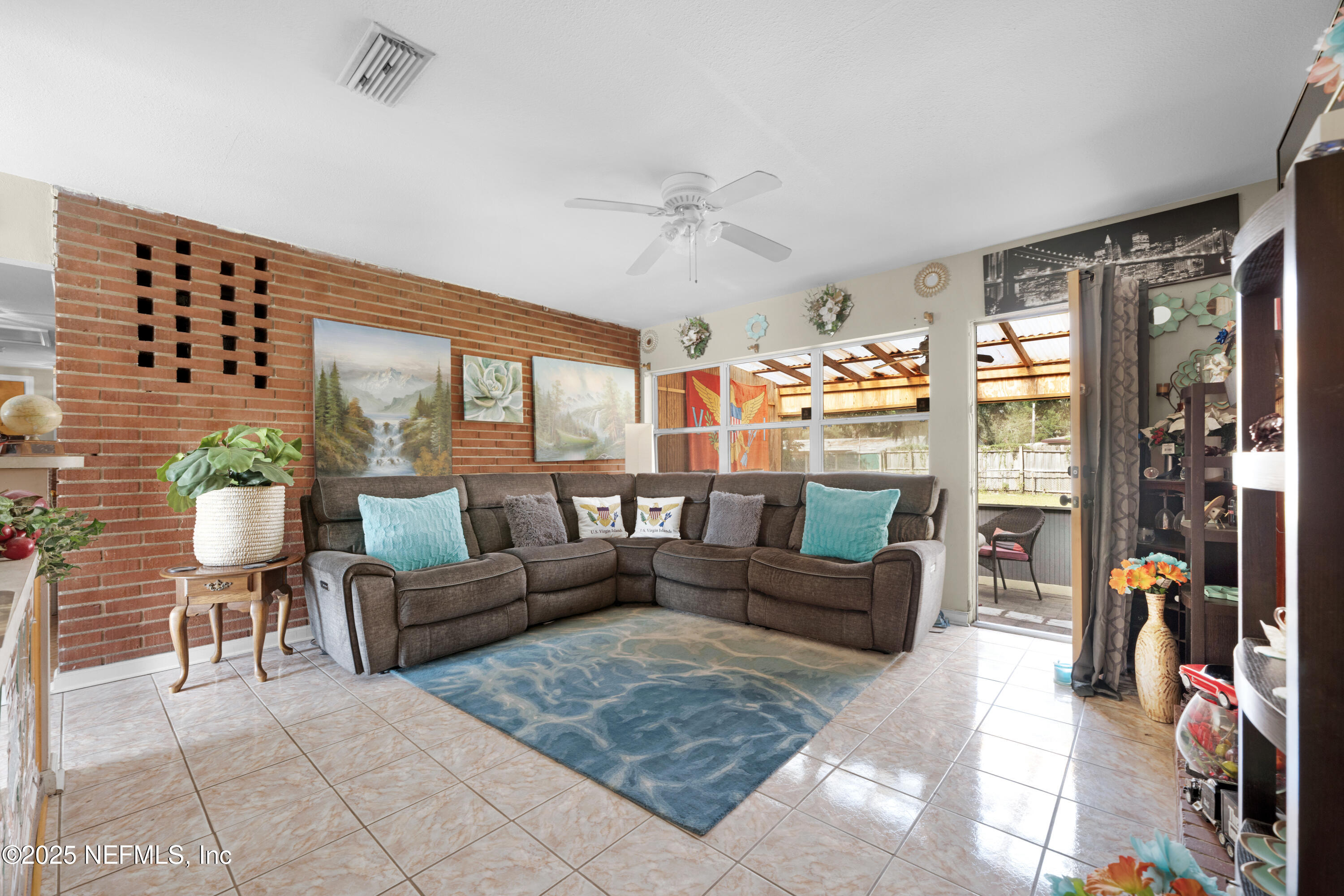 5845 Ransom Street Jacksonville, FL 32211 - Photo 6 of 23 a living room with furniture large window and outer view