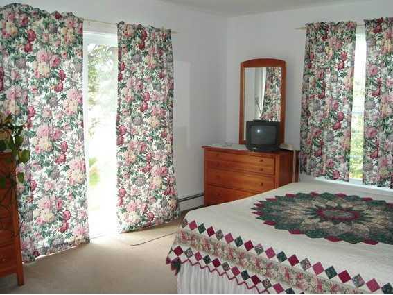 67 Anns Point Road Bass Harbor, ME 04653 - Photo 6 of 11 Bedroom. Sunny master bedroom with...
