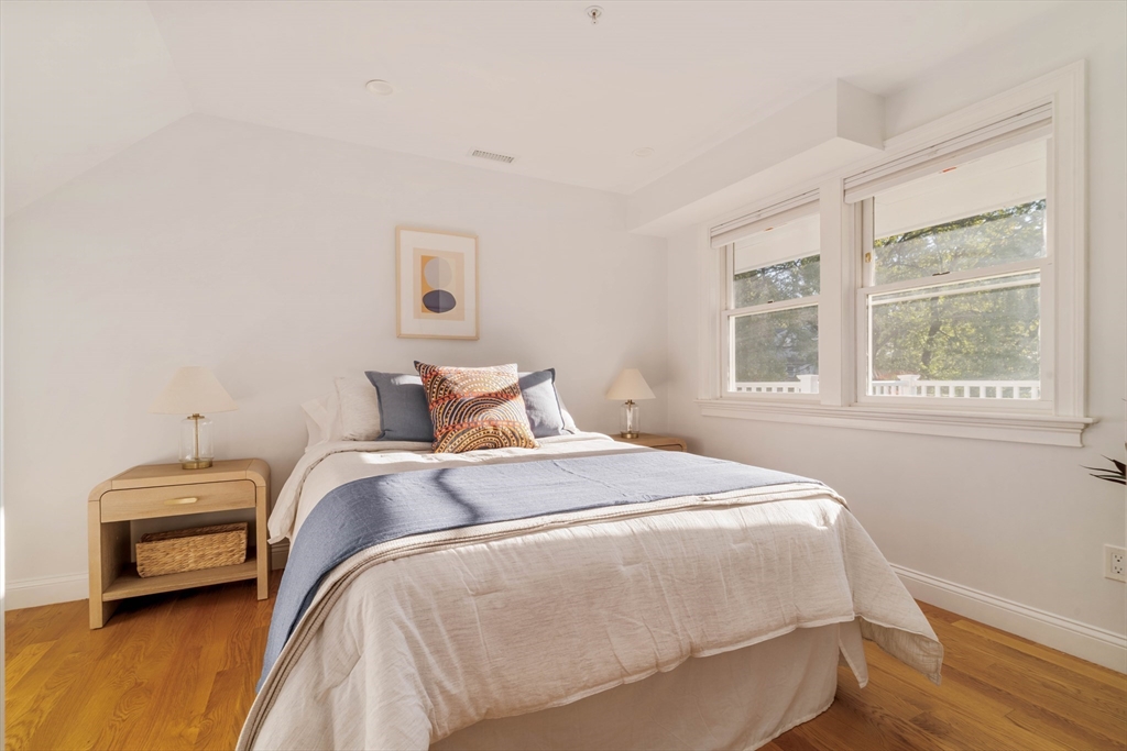 59 Berkeley Street, Unit 3 Somerville, MA 02143 - Photo 11 of 18 a bedroom with a bed and a window