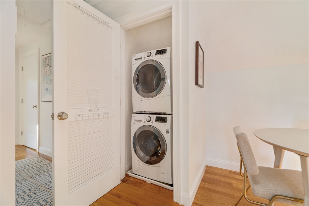 59 Berkeley Street, Unit 3 Somerville, MA 02143 - Photo 16 of 18 a utility room with sink dryer and washer