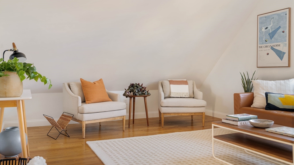 59 Berkeley Street, Unit 3 Somerville, MA 02143 - Photo 3 of 18 a living room with furniture and a couch