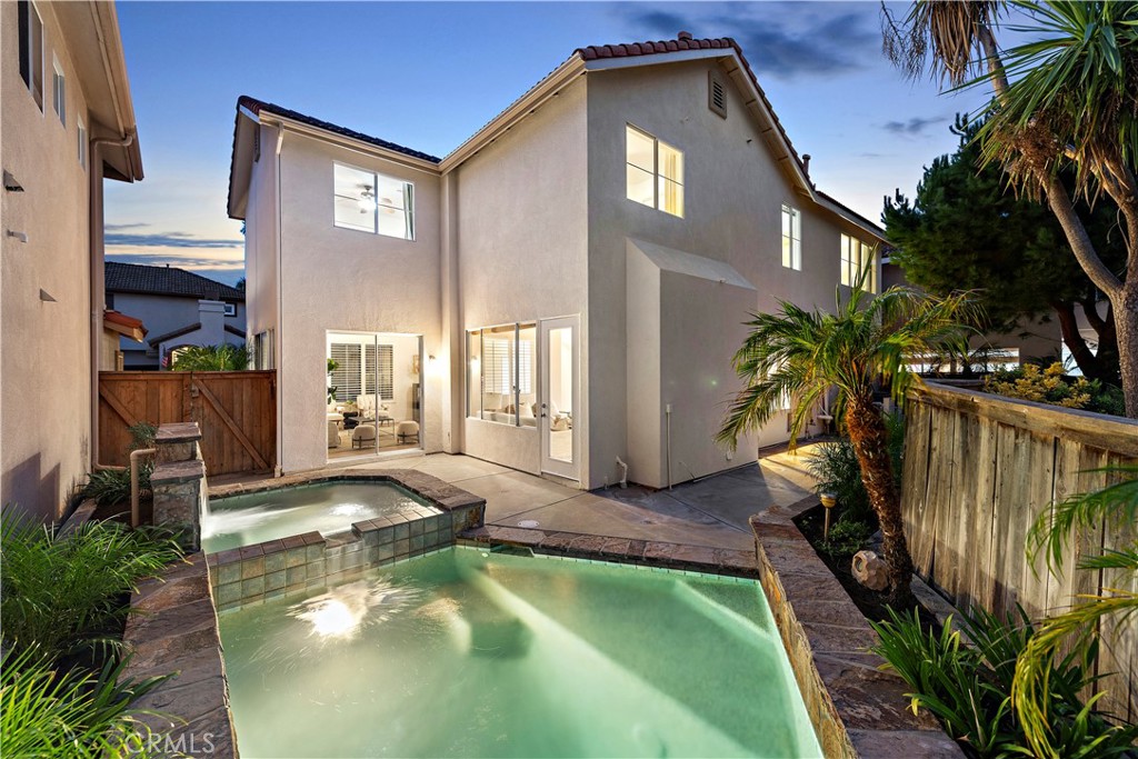 a view of swimming pool with a patio