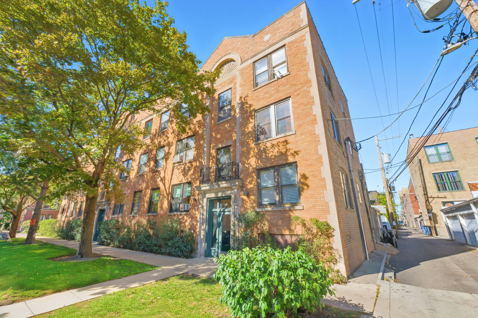 1014 West Barry Avenue, Unit 1 Chicago, IL 60657 - Photo 1 of 17 a sign board with buildings in the background