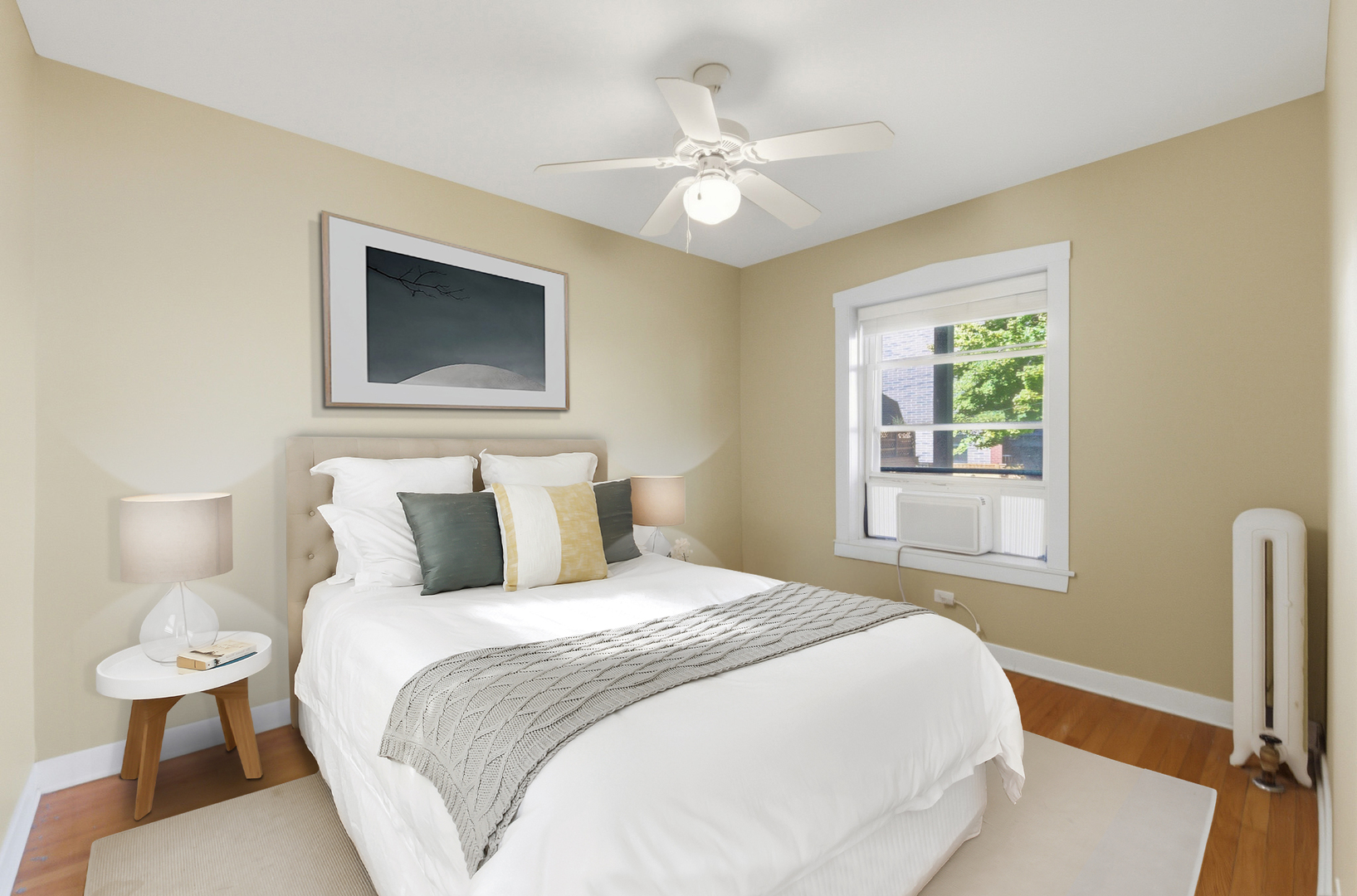 1014 West Barry Avenue, Unit 1 Chicago, IL 60657 - Photo 8 of 17 a bedroom with a bed and a chandelier
