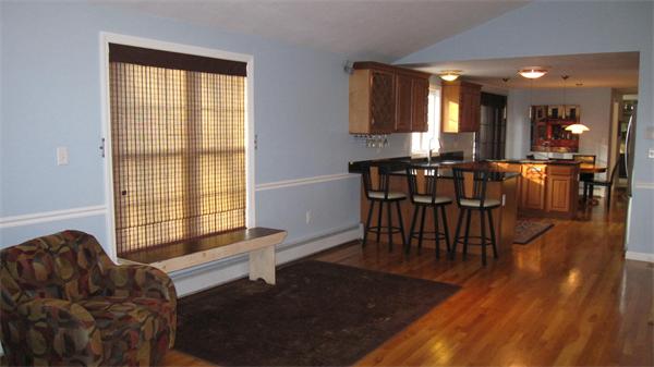 7 Sidney Road Sturbridge, MA 01566 - Photo 6 of 30 a living room with furniture and a wooden floor