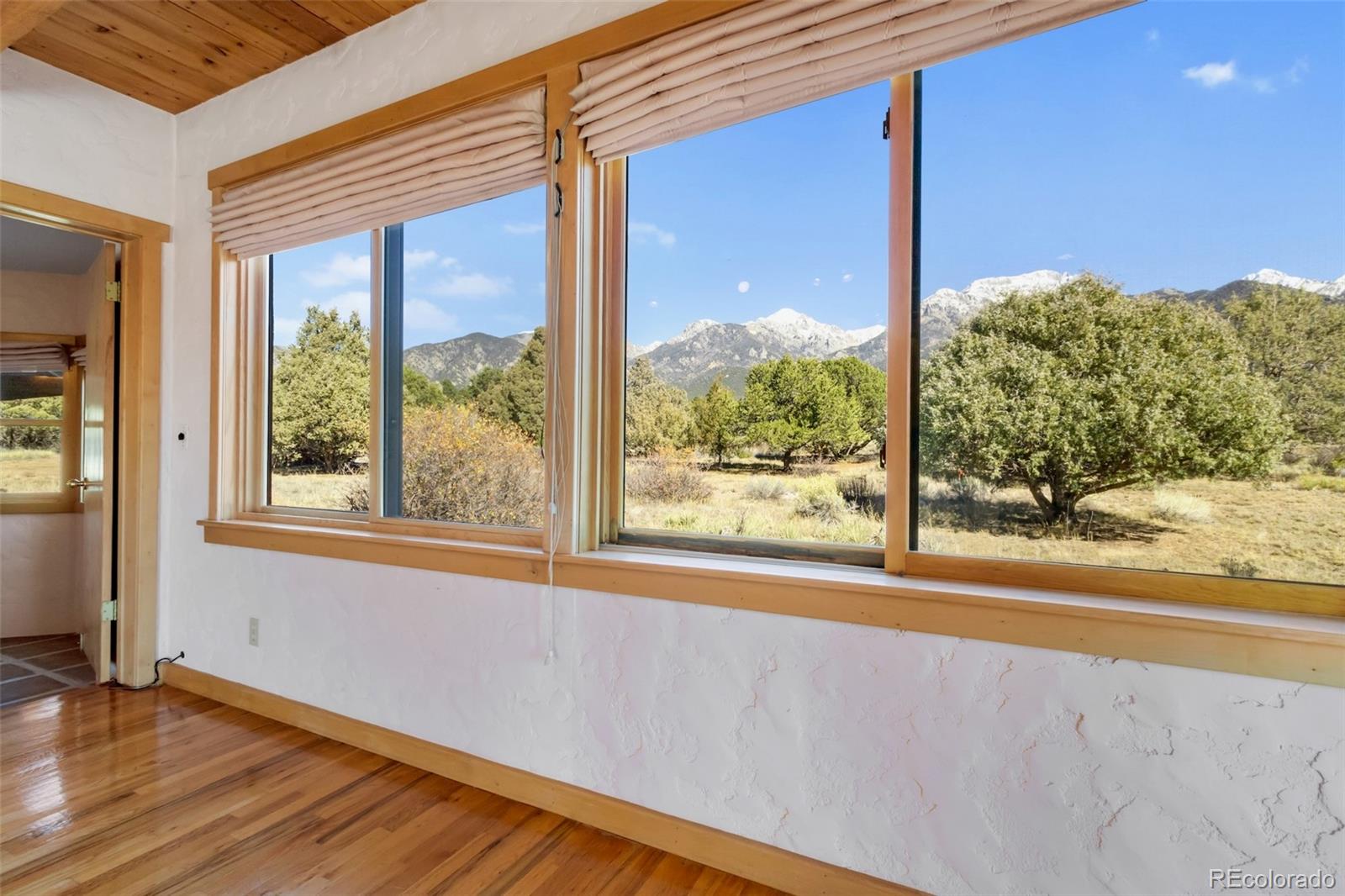 1507 Wagon Wheel Road Crestone, CO 81131 - Photo 11 of 50 a view of a room with a large window