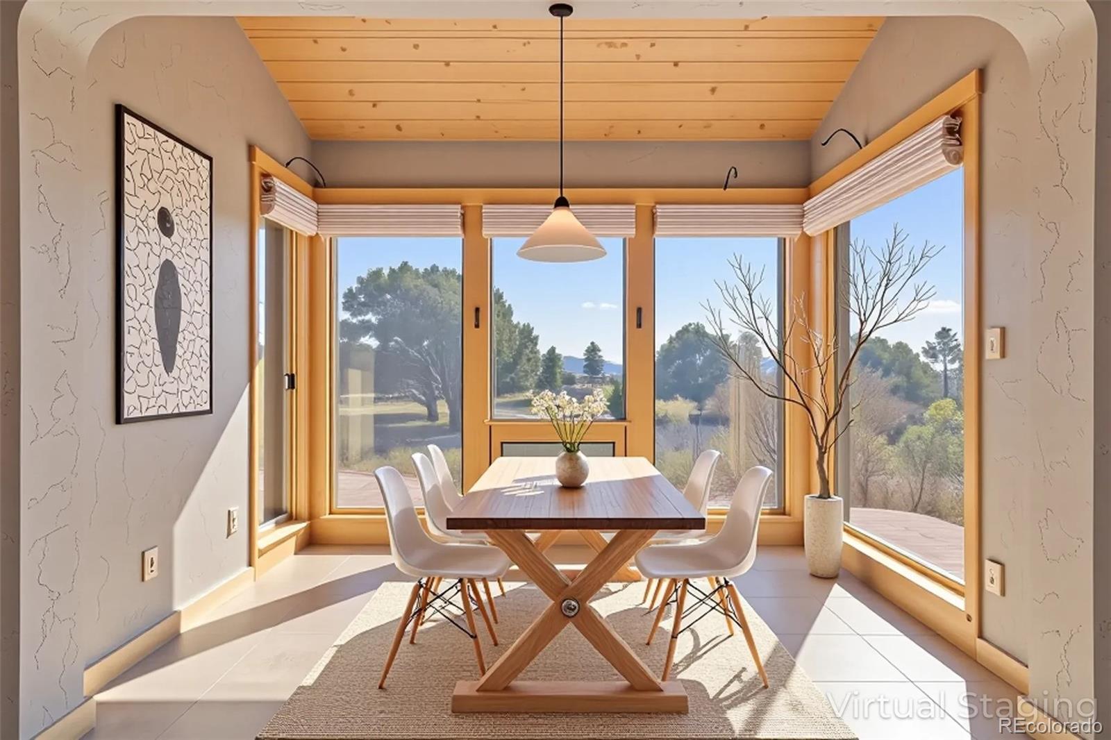 1507 Wagon Wheel Road Crestone, CO 81131 - Photo 15 of 50 a dining room with furniture and a window