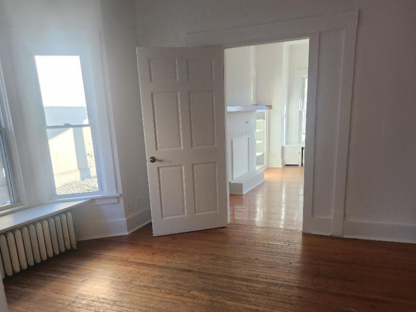 345 Augusta Avenue DeKalb, IL 60115 - Photo 18 of 25 a view of hallway with wooden floor