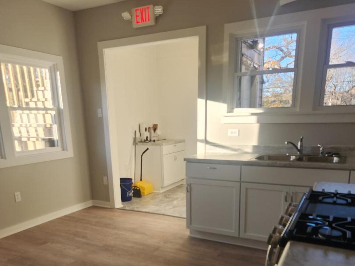 345 Augusta Avenue DeKalb, IL 60115 - Photo 21 of 25 a room with a window and a sink