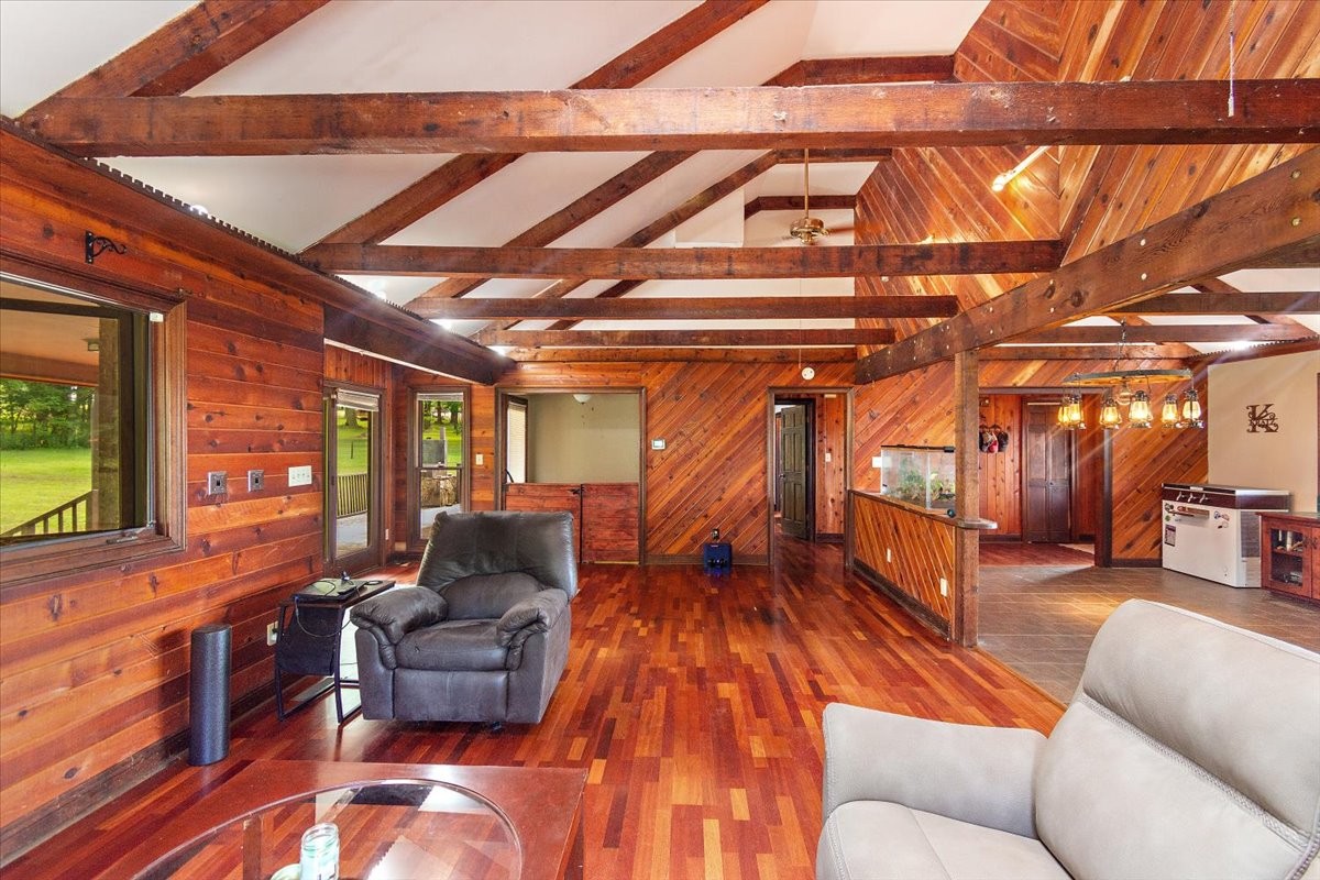 1510 Penile Hill Road Decherd, TN 37324 - Photo 12 of 34 a outdoor living space with furniture and a ceiling fan