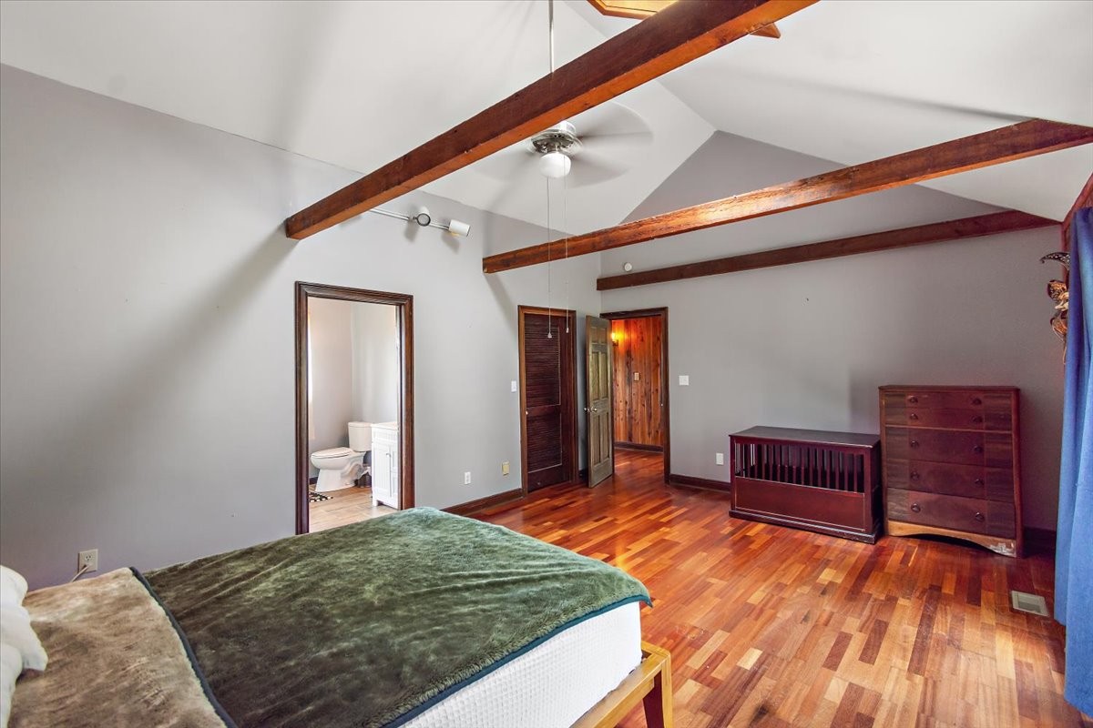 1510 Penile Hill Road Decherd, TN 37324 - Photo 17 of 34 a bedroom with a bed and a dresser