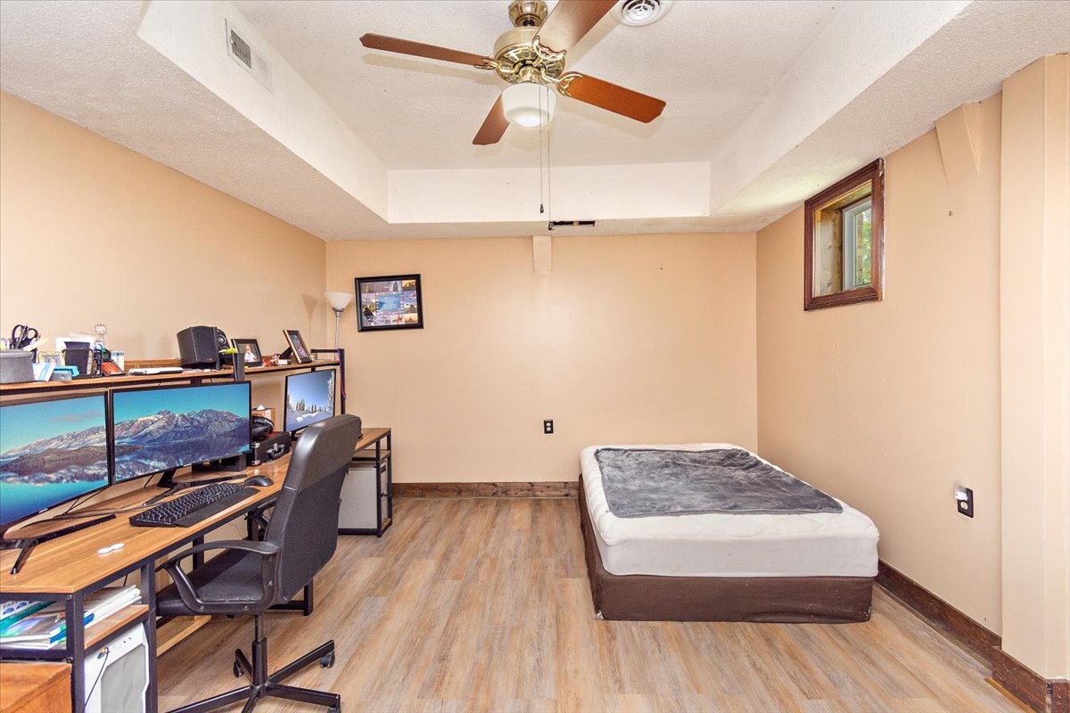 1510 Penile Hill Road Decherd, TN 37324 - Photo 23 of 34 a bedroom with a bed and a dresser