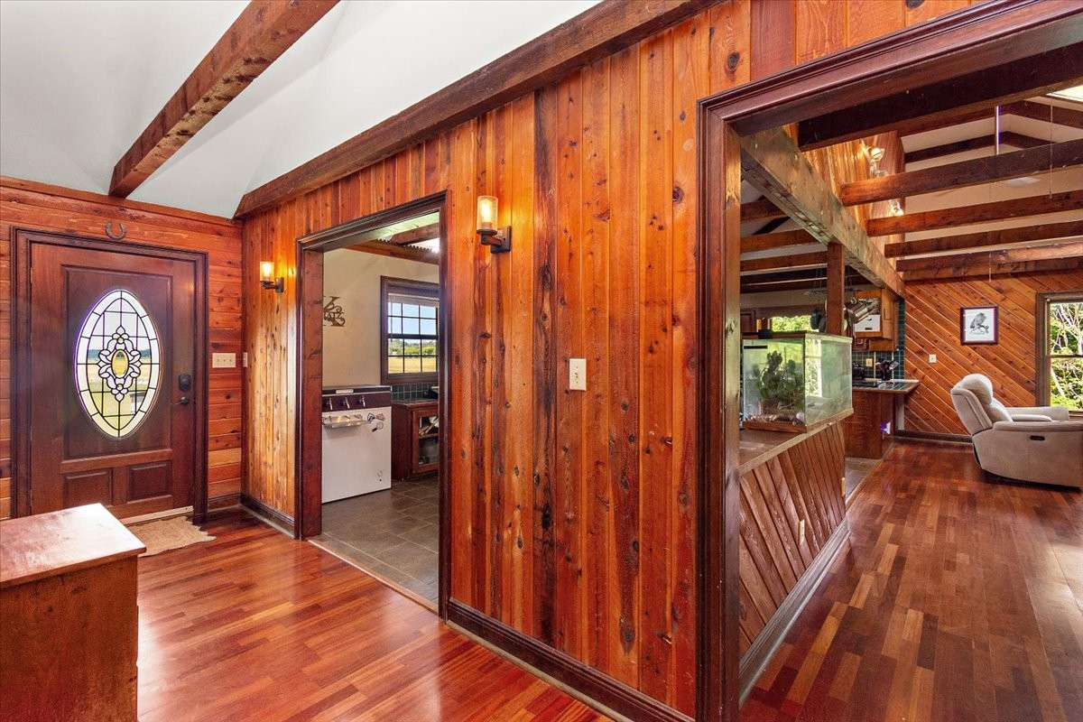 1510 Penile Hill Road Decherd, TN 37324 - Photo 6 of 34 a view of living room kitchen with furniture and wooden floor