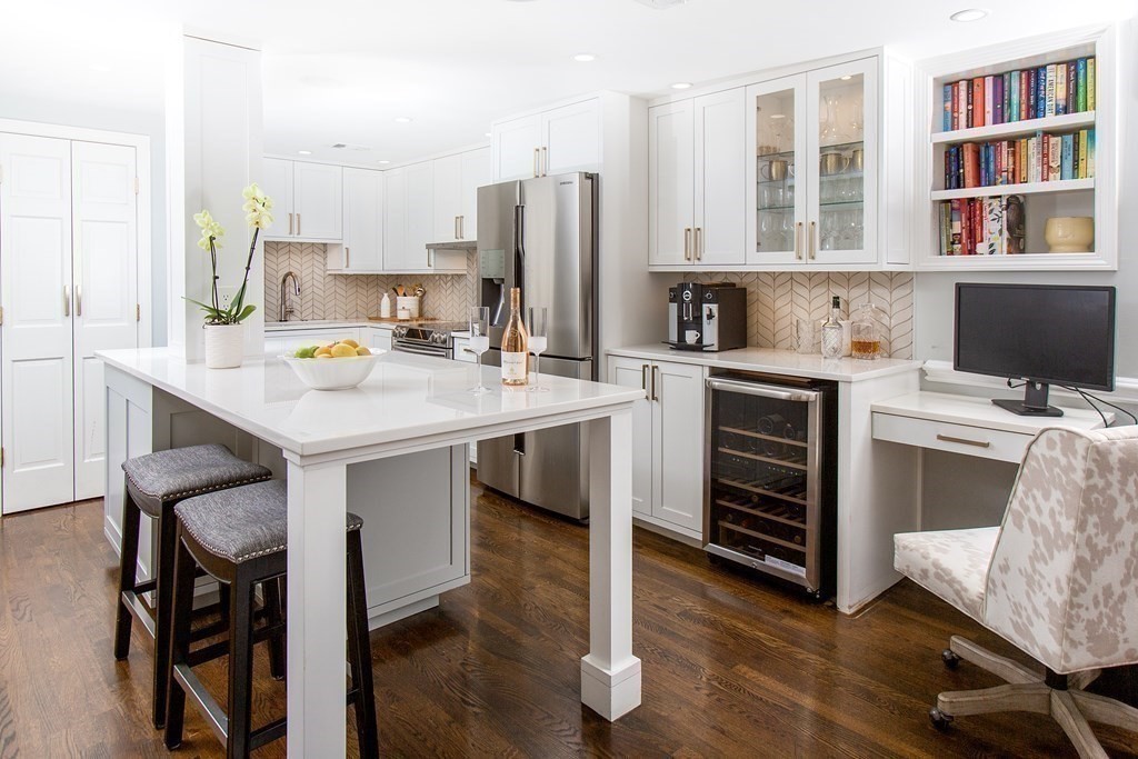 40 Joy Street, Unit 2 Boston, MA 02114 - Photo 4 of 13 a view of kitchen with cabinets and wooden floor