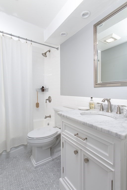 40 Joy Street, Unit 2 Boston, MA 02114 - Photo 7 of 13 a bathroom with a sink toilet and shower