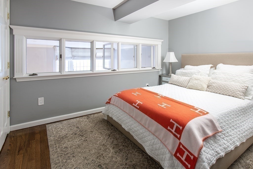 40 Joy Street, Unit 2 Boston, MA 02114 - Photo 8 of 13 a bedroom with bed and window