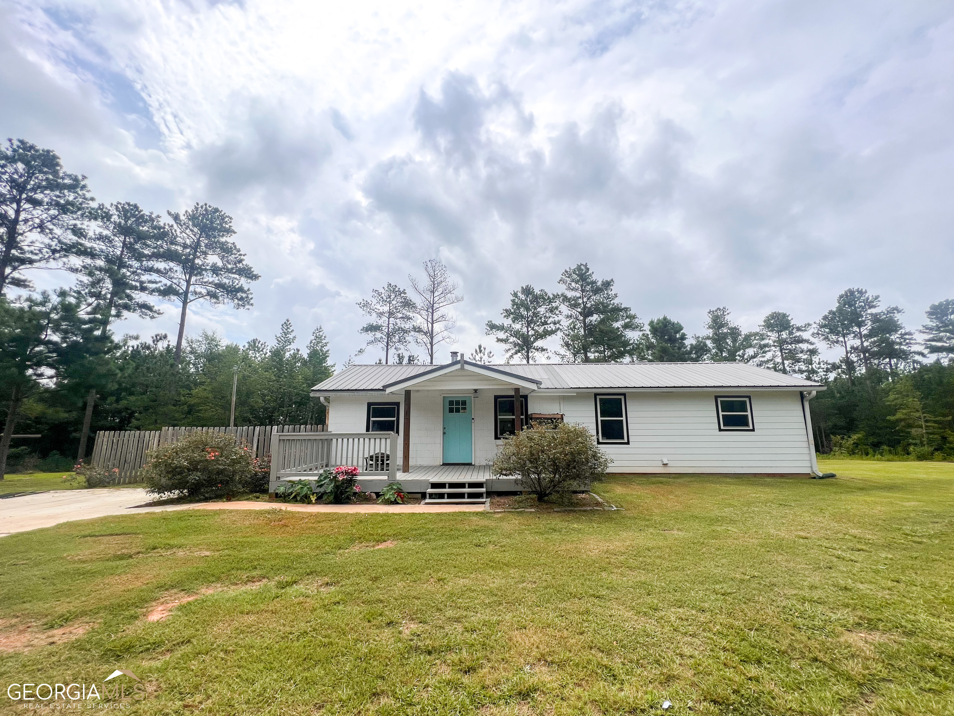 697 Alabama Road Franklin, GA 30217 - Photo 1 of 1 a view of a house with a backyard