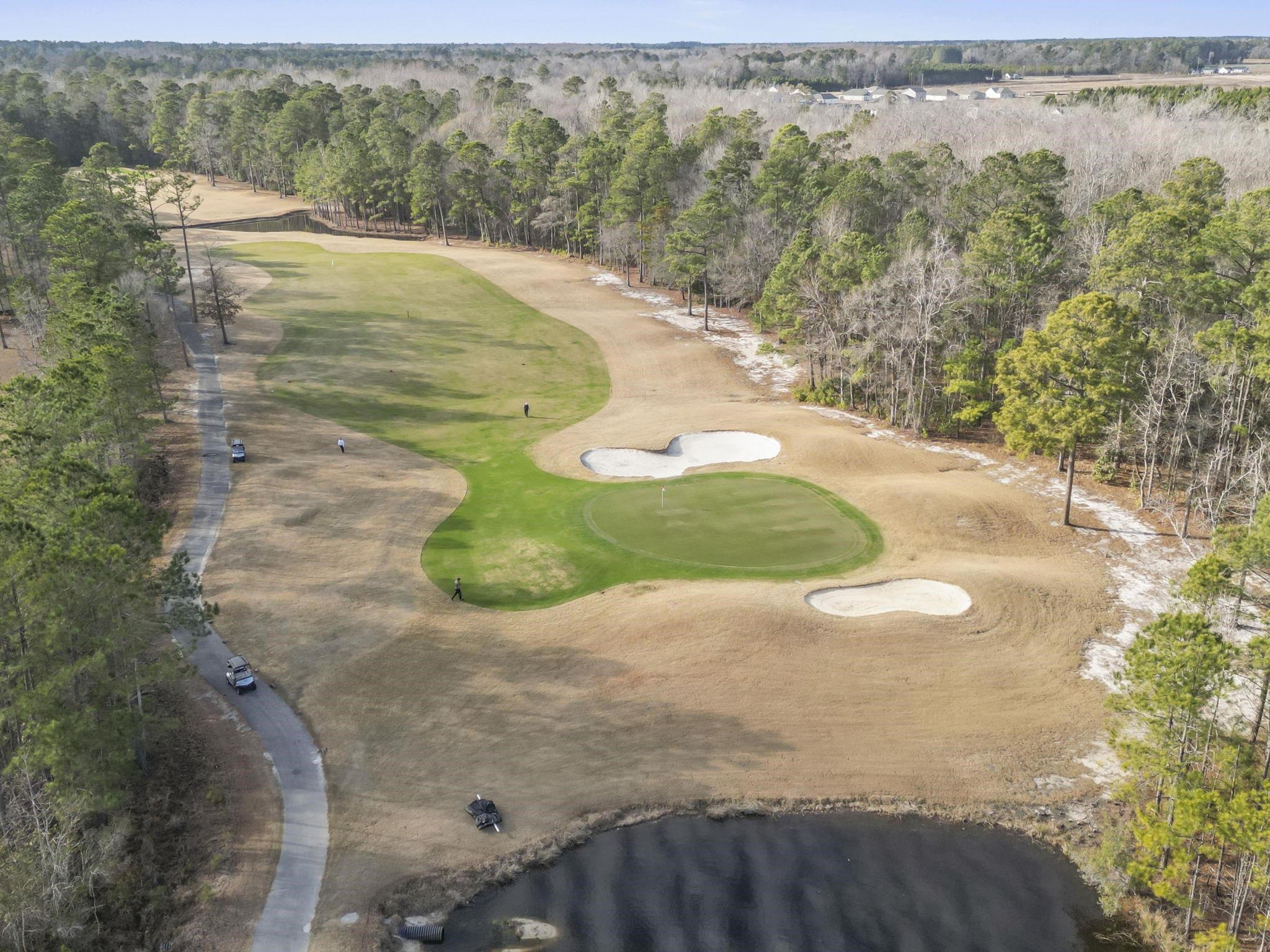 565 Timber Creek Drive Loris, SC 29569 - Photo 37 of 37 View of property location featuring a local golf course and a tree filled landscape