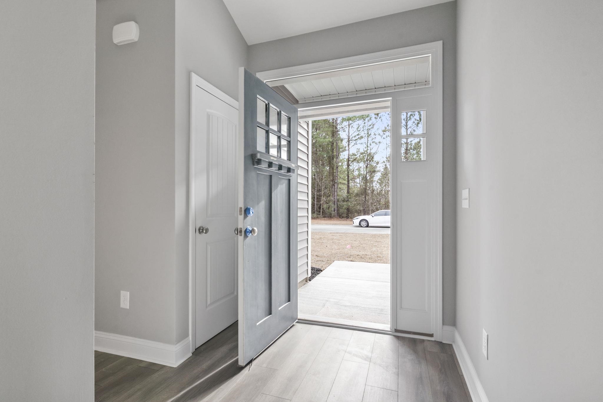 565 Timber Creek Drive Loris, SC 29569 - Photo 6 of 37 Entrance foyer featuring baseboards and light wood-style flooring