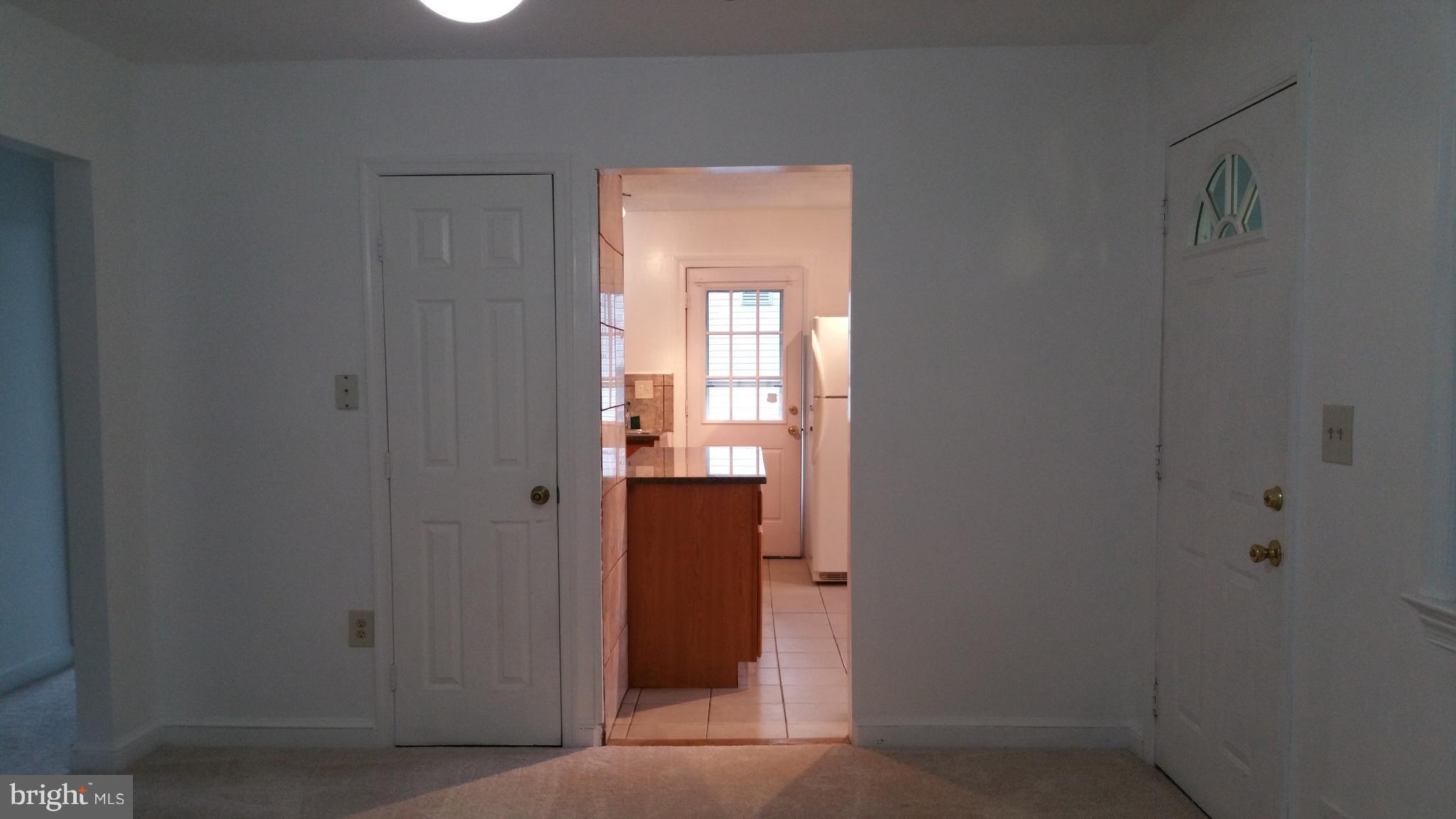 416 Denham Road Rockville, MD 20851 - Photo 10 of 25 Living room to kitchen