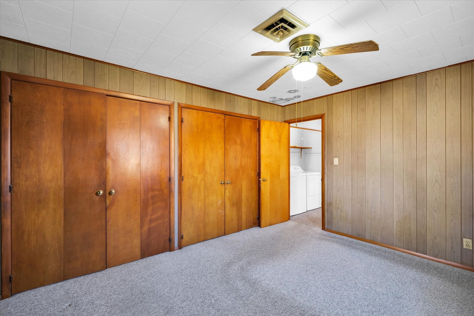 2406 John Drive Urbana, IL 61802 - Photo 19 of 28 a view of a room with a window and a ceiling fan