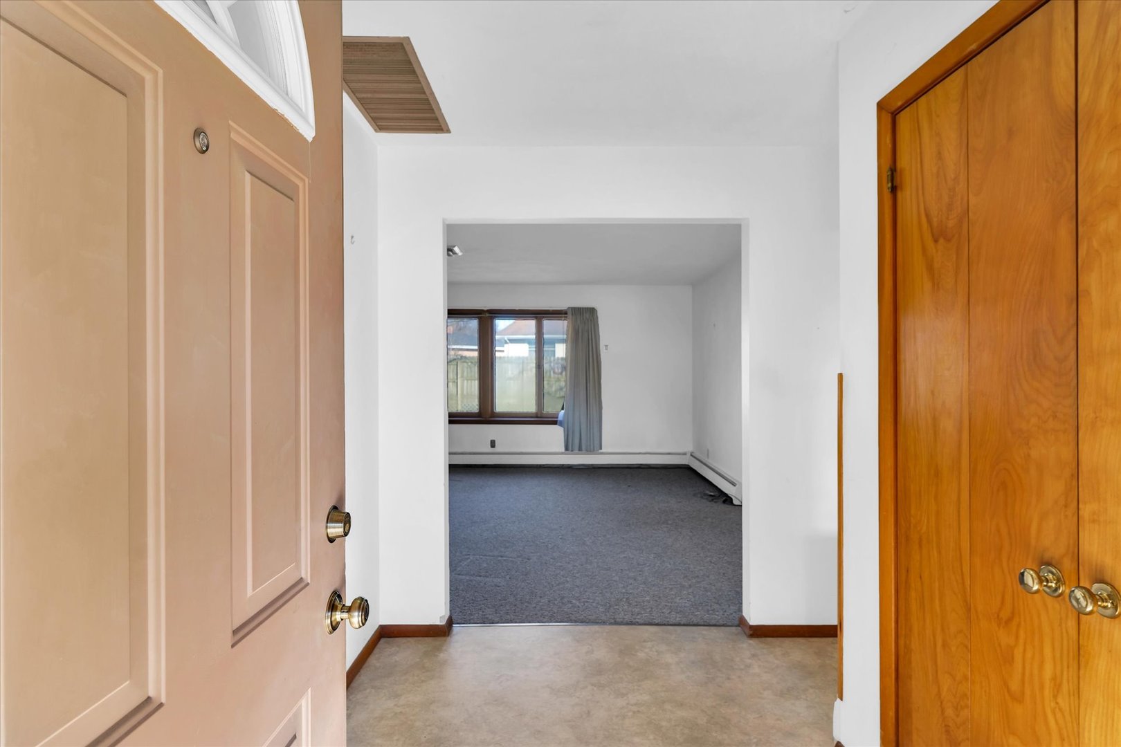 2406 John Drive Urbana, IL 61802 - Photo 5 of 28 a view of a room with a wardrobe space