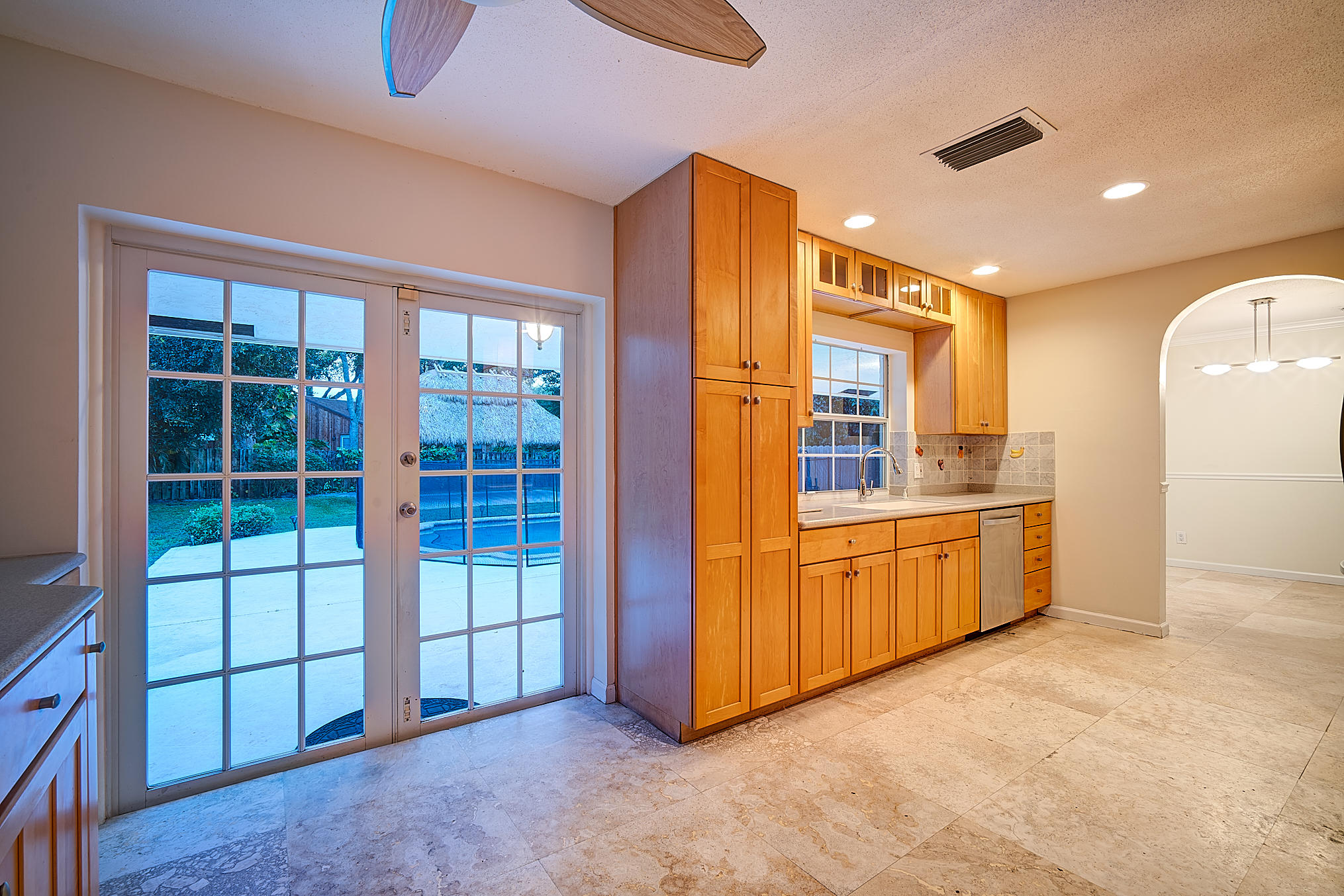 1120 Southwest 20th Street Boca Raton, FL 33486 - Photo 12 of 53 a view of a kitchen with a sink and a large window