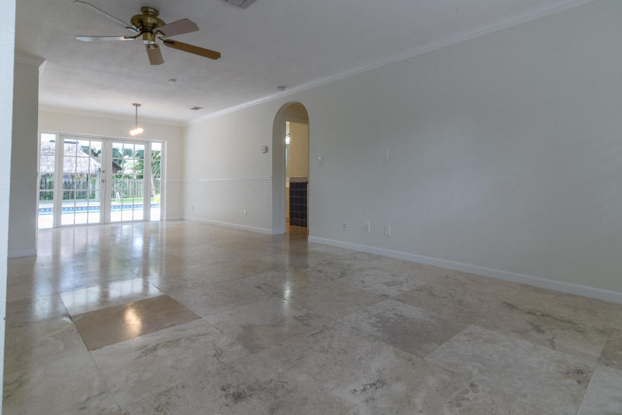 1120 Southwest 20th Street Boca Raton, FL 33486 - Photo 16 of 53 en empty room with windows and outdoor view