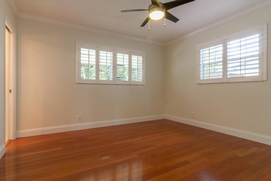 1120 Southwest 20th Street Boca Raton, FL 33486 - Photo 21 of 53 wooden floor in an empty room with a window