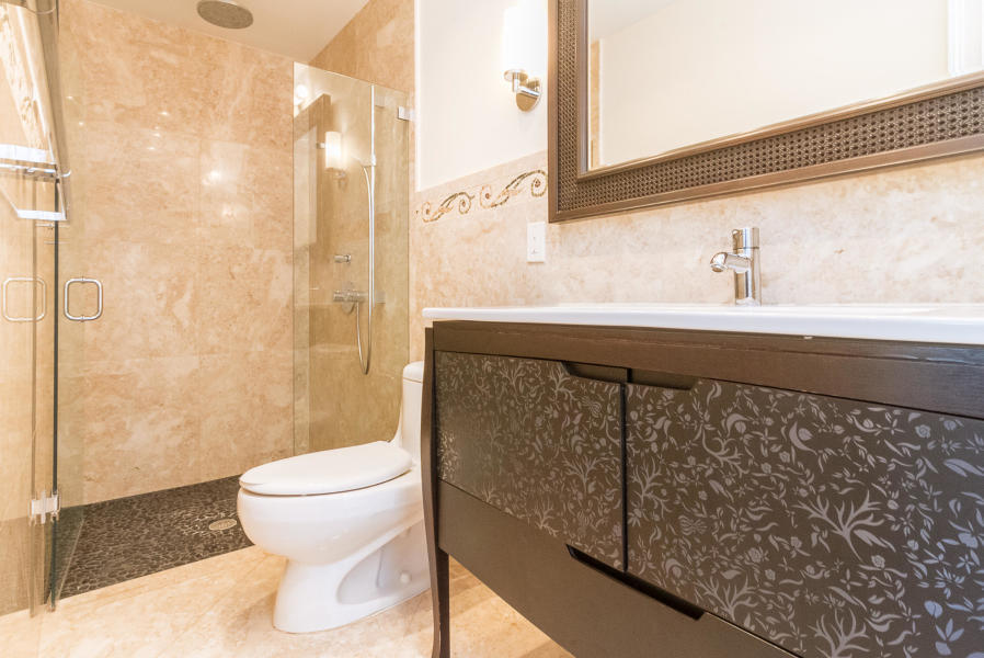 1120 Southwest 20th Street Boca Raton, FL 33486 - Photo 22 of 53 a bathroom with a sink and a toilet