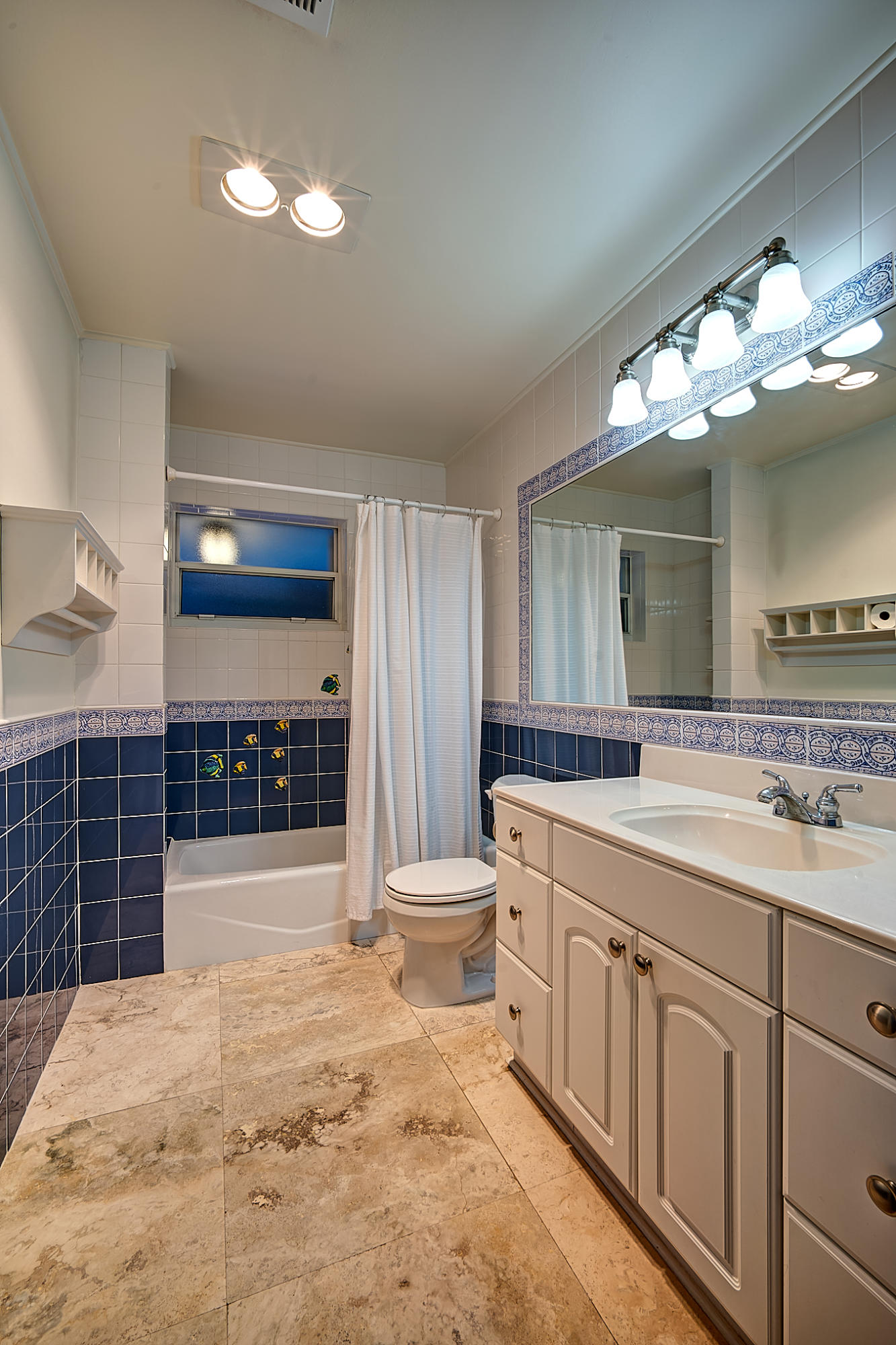1120 Southwest 20th Street Boca Raton, FL 33486 - Photo 25 of 53 a bathroom with a sink a toilet and a shower