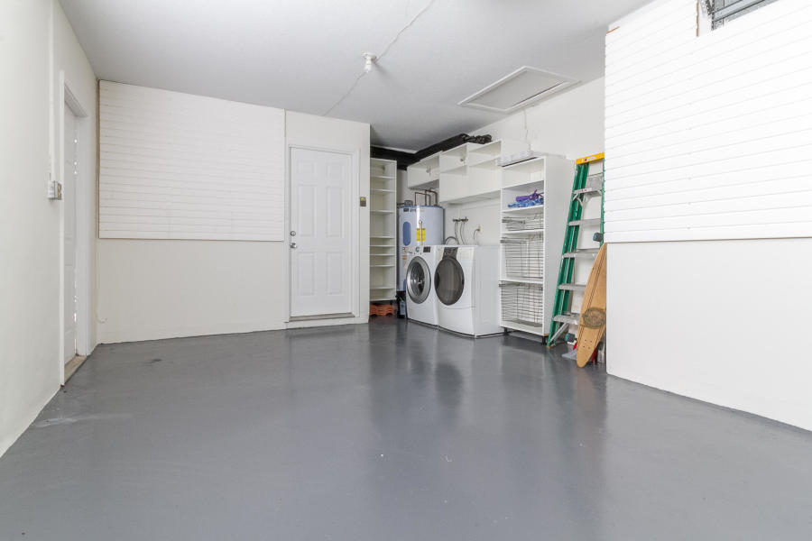 1120 Southwest 20th Street Boca Raton, FL 33486 - Photo 38 of 53 a view of a storage & utility room with a window