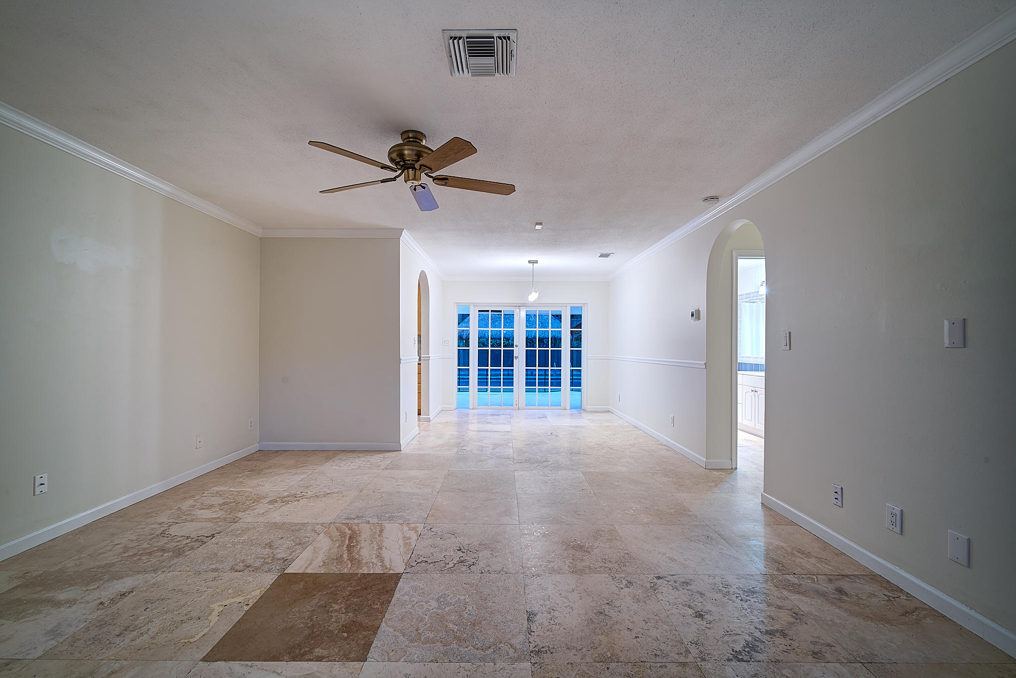 1120 Southwest 20th Street Boca Raton, FL 33486 - Photo 50 of 53 a view of livingroom with a ceiling fan and window