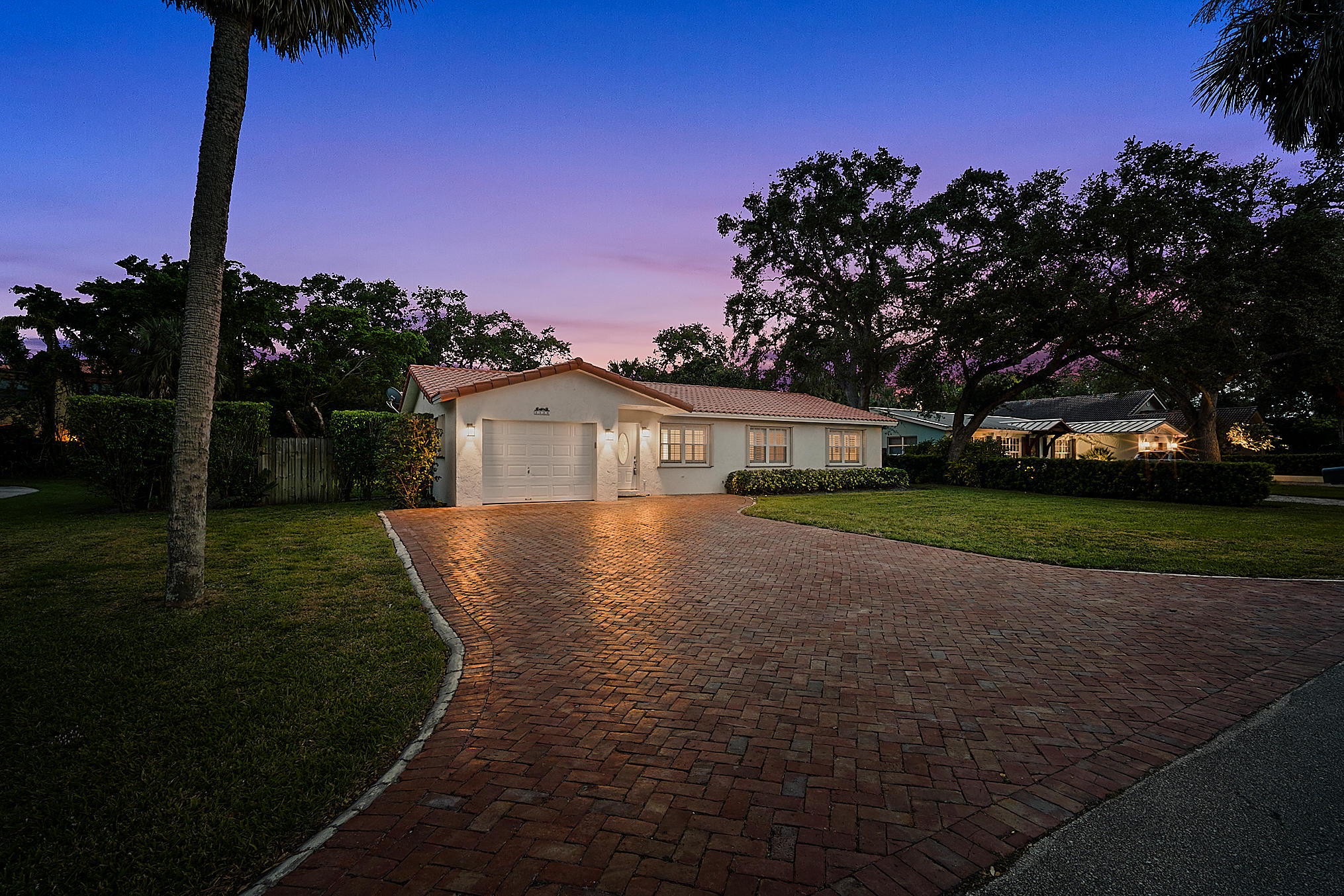 1120 Southwest 20th Street Boca Raton, FL 33486 - Photo 51 of 53 a front view of a house with a yard