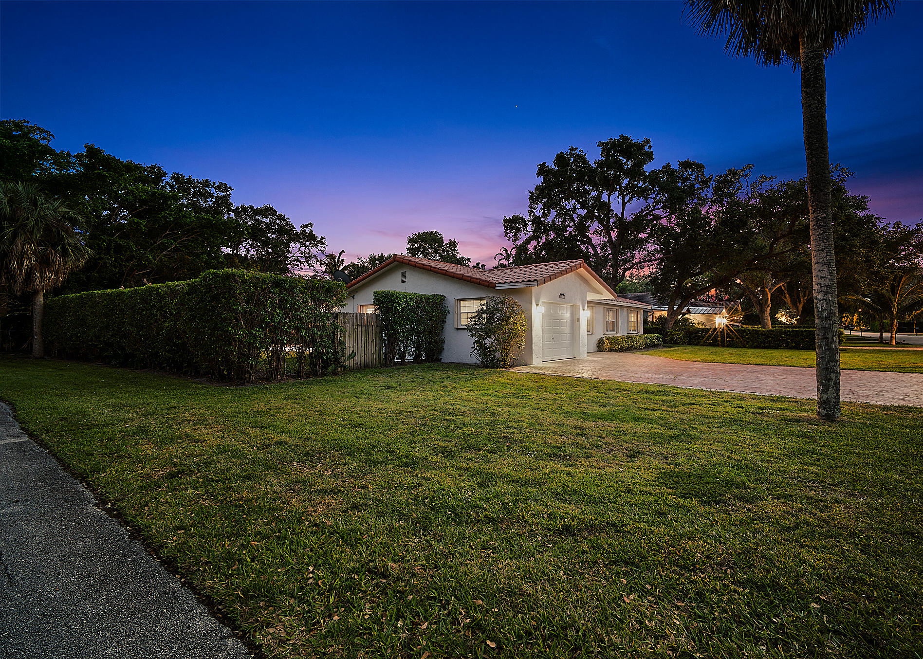 1120 Southwest 20th Street Boca Raton, FL 33486 - Photo 53 of 53 a front view of a house with garden