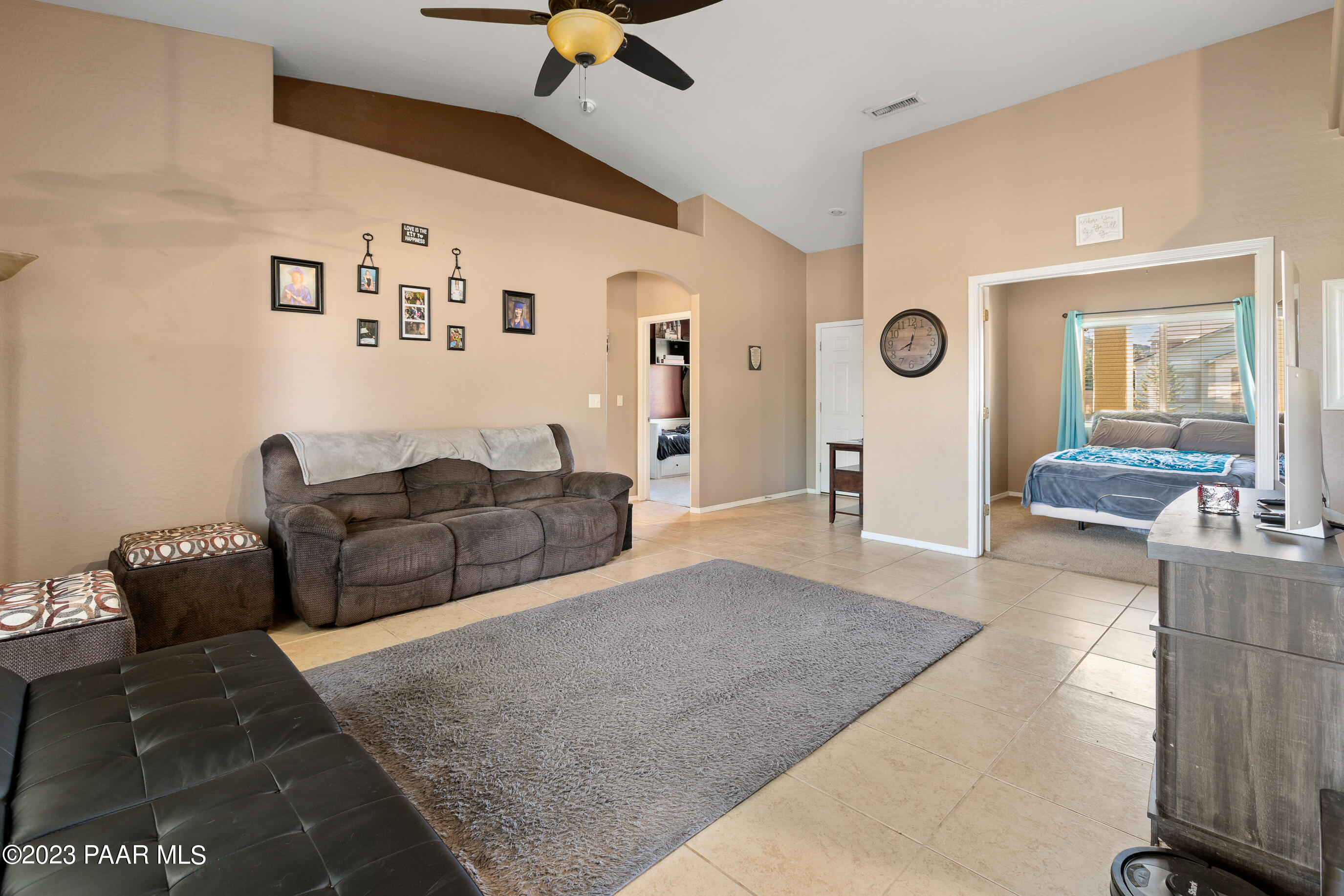 6622 Farmstead Road Prescott Valley, AZ 86314 - Photo 4 of 14 a living room with furniture and wooden floor