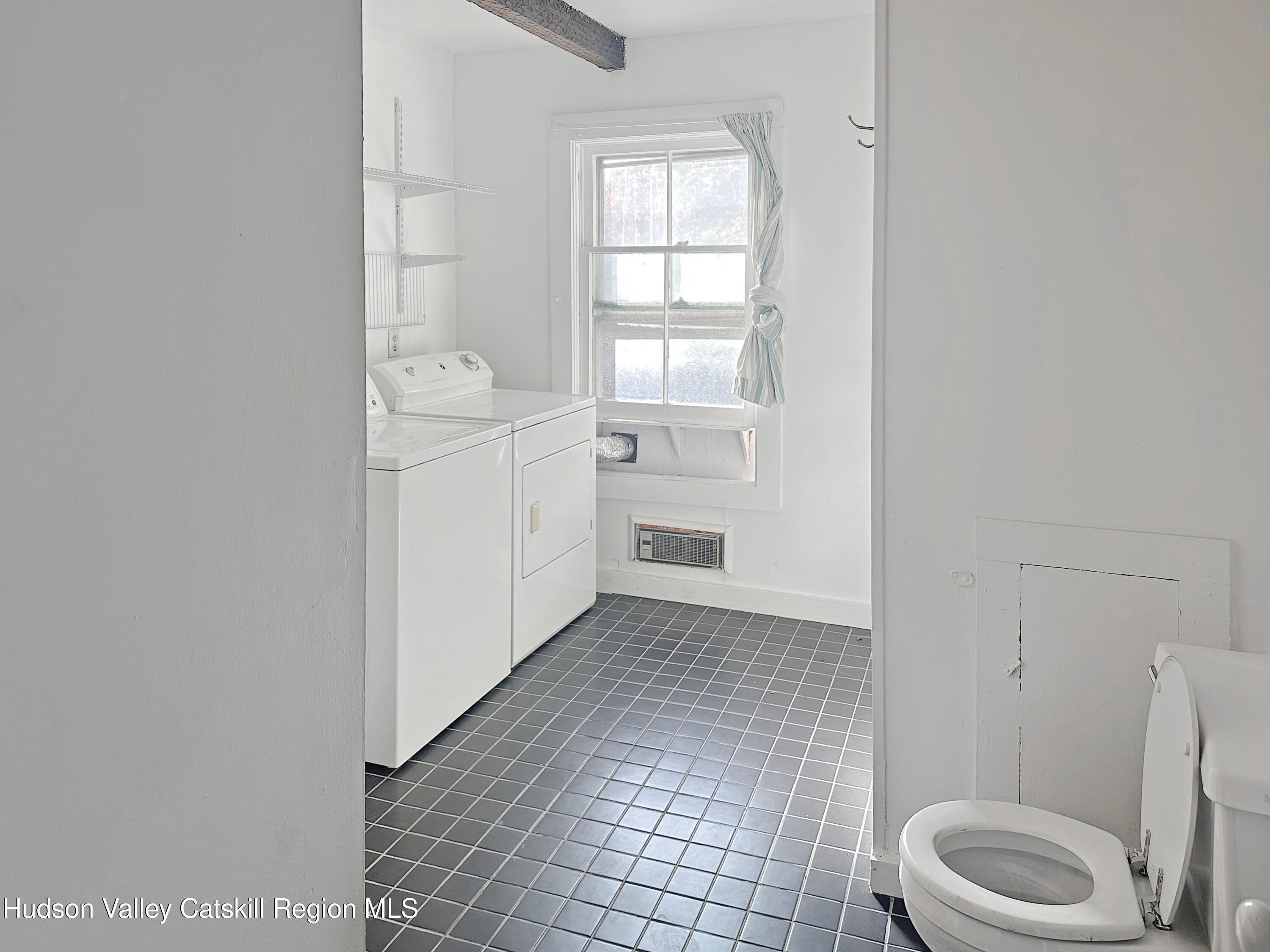 72 Meads Mountain Road, Unit 5 Woodstock, NY 12498 - Photo 14 of 20 a bathroom with a sink toilet and window