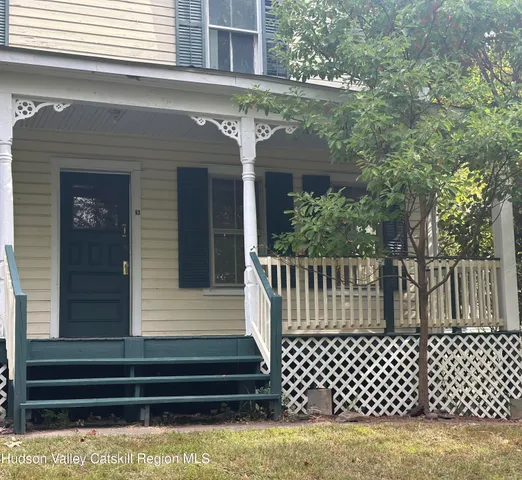 a view of a house with a large window