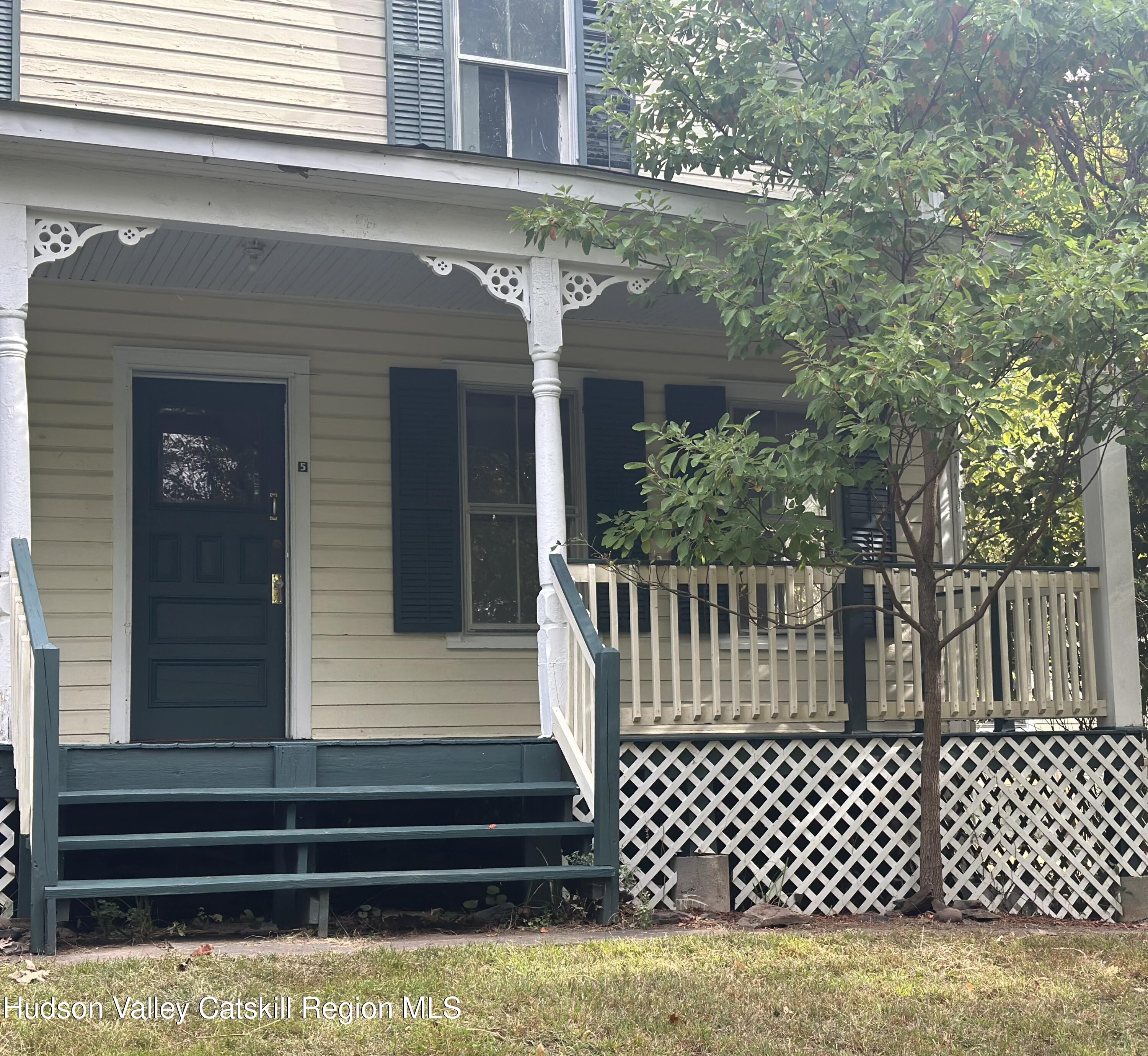 72 Meads Mountain Road, Unit 5 Woodstock, NY 12498 - Photo 17 of 20 a view of a house with a large window